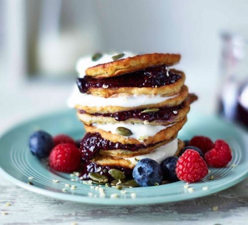 Gluten-free pancake recipes stack of pancakes with blueberries and raspberries