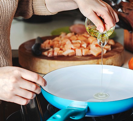 Top 11 healthiest cooking oils Pouring olive oil into a pan