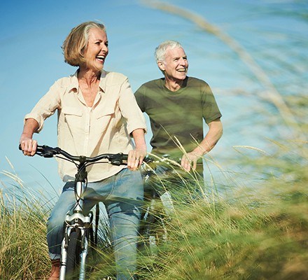 Man and woman cycling