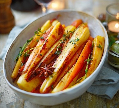 Maple roots with herbs in an oval dish