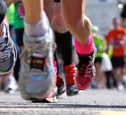 Close up of marathon runners legs and shoes