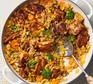 A pan filled with one-pot chicken & rice dish