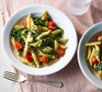 Pesto spinach penne in bowls