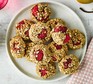 Raspberry, almond & oat breakfast cookies served on a plate