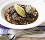 Beef bourguignon with celeriac mash in a bowl