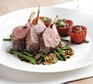 Rack of lamb with warm salad of mixed beans & slow-roast tomatoes