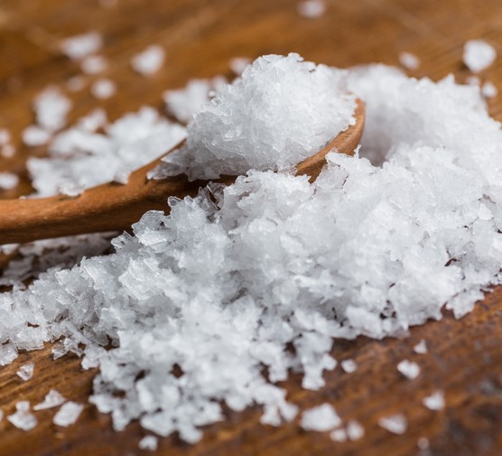 Maldon sea salt on wooden spoon