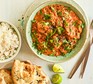 Slow cooker chicken tikka masala Slow cooker chicken tikka masala served with rice and naan bread