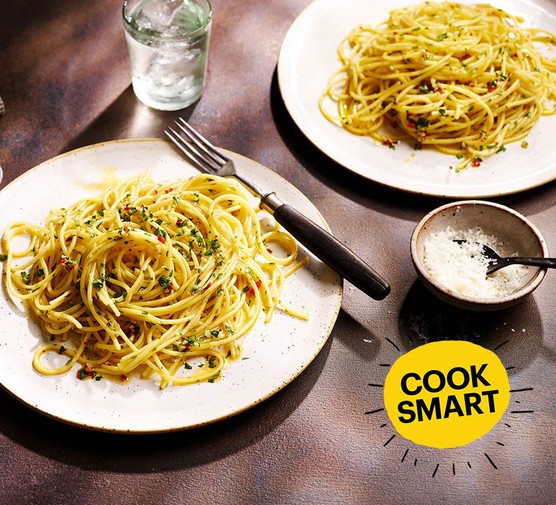 Two plates of spaghetti