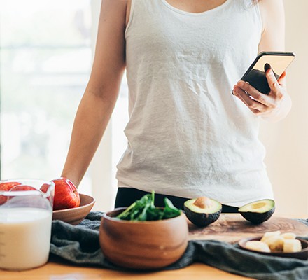 A woman calculating calories