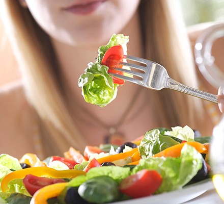 Woman eating a salad
